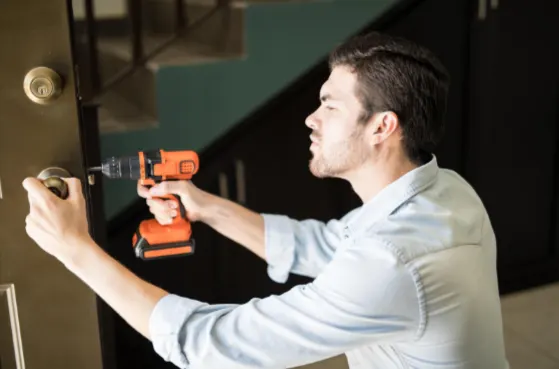 Garage Door Lock Replacement in Metro Atlanta by Garage Doors by Robert technician.